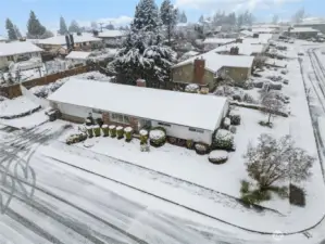 Situated on a large corner lot, this West End Tacoma home has ample parking, on and off street.