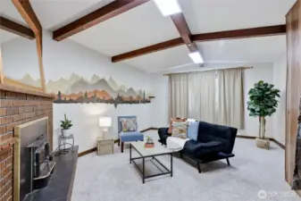 Tucked just off the kitchen and laundry area, this family room offers a comfortable, connected living space.