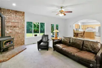 Family room with wood burning fireplace