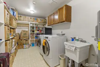 Utility room with washer and dryer.