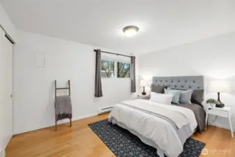Large open bedroom with built in closet space.