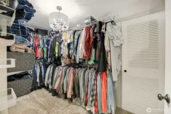 Primary walk-in closet.