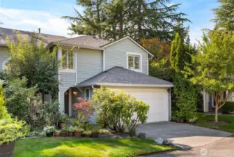 Cul-de-sac location with 2 car garage, 2 car driveway and 5 guest parking spots. Front deck sitting area with front yard and garden space. Right side of house additional garden space.
