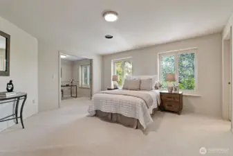 Large primary bedroom with additional attached room and 5 piece bathroom.
