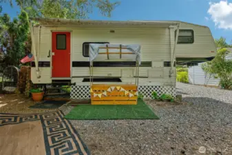 Outdoor semi-permanent space for additional playroom, office, or storage