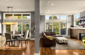 Large great room with an abundance of windows and light
