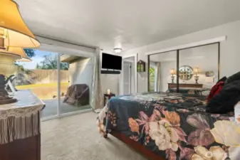 Sliding glass doors lead to the back patio