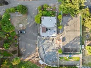 Ariel view of clubhouse, sports court and pool (covered for the season)