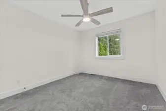 Bedroom #3. Has full-size closet not shown. Window coverings convey