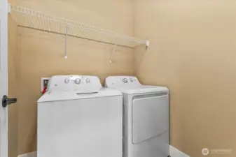 Utility room next to garage exit. Ask about the "centralized hub" or also called a "plumbing distribution manifold"  that is located behind the door. We recommend that you learn about this key feature if it's new for you