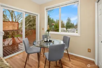 The breakfast nook opens to a large deck, perfect for grilling or entertaining.