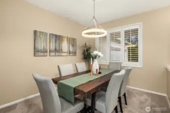 Formal dining room off the entry with convenient access to the kitchen.