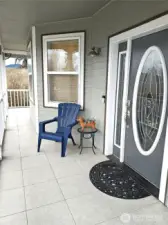 Lovely stained glass front door takes you into the entry way.