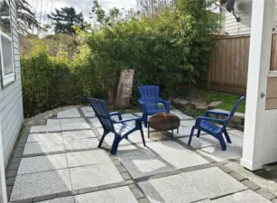 Patio and BBQ area, great for relaxing or entertaining. Over $20,000 spent on creating this oasis. Just step out from the kitchen to enjoy the ambiance. BBQ conveys