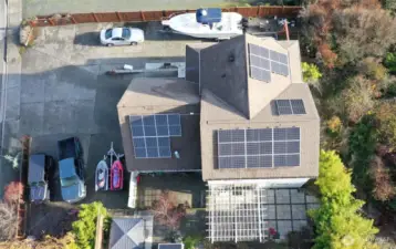 Solar panels installed over several parts of the roof. Currently provide enough power for the home and hot tub. Keeps monthly bills for electric as low as $7.99 for a connection fee.