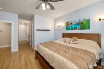 Primary bedroom includes ensuite bathroom with shower, bathtub, and walk in closet.