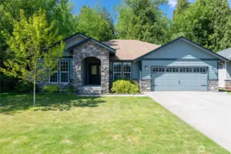 Step into this beautifully designed open-concept living space that seamlessly connects the kitchen, dining, and family room—perfect for entertaining or relaxing at home.