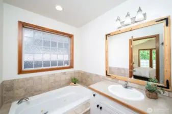 Unwind in the jetted soaking tub, enjoy the convenience of a separate walk-in shower.