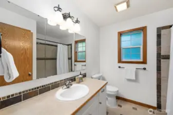 Tile floors, and plenty of vanity space to share.