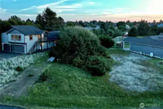 This picturesque waterfront home offers stunning views and a thoughtfully designed layout. Adjacent to the property, lot 436 is available for purchase at $100,000. This additional space provides an excellent opportunity to expand your waterfront oasis
