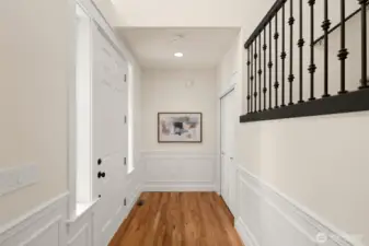 Step inside to a gracious entry featuring hardwood floors and newly painted millwork—setting the tone for the care and quality found throughout the home.