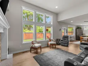 The wall of windows in the living room flood this home with natural light.