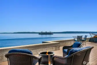 Epic year-round views from your spacious Trex deck. If the weather isn't agreeable, you can still enjoy the views from most of the rooms inside the home. Seattle skyline in the distance.
