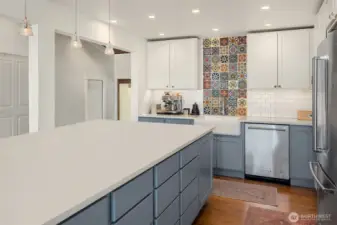 Oodles of kitchen storage as well as a walk-in pantry! Plenty of counter space for throwing a party, enjoying a casual dining experience, or setting up a work station.