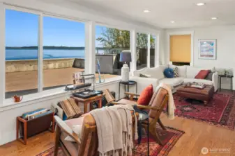 A comfortable space that could be used for a living room, dining room, or maybe close it in for a 3rd bedroom.