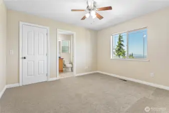 1 of two primary bedrooms