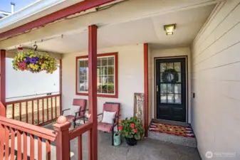 Covered front patio. Perfect for watching the sunset