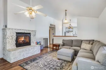 The beautiful fireplace serves as a stunning focal point adding warmth to the living space.