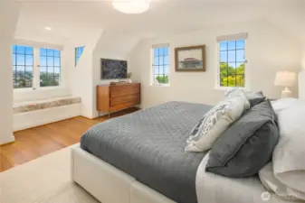 Primary with sweet window seat and views! Walk-in closet not pictured