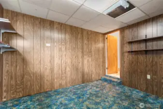 Study between the kitchen and the living room (labeled bedroom on the floorplan)