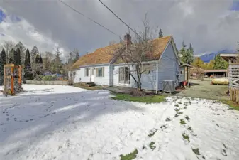 North side of home - fully fenced front yard