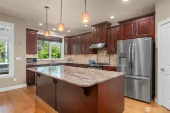 Pantry door to right of refrigerator...