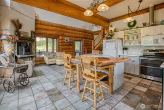 Open concept with windows all around, just like the wraparound deck!