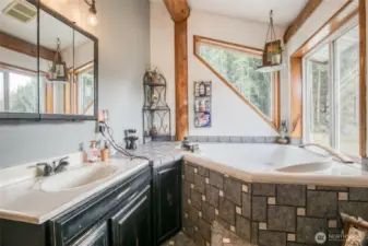 Upper floor attached bathroom, corner tub w/ view