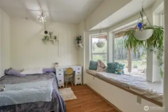 Bottom floor bedroom 1 with seated bay window