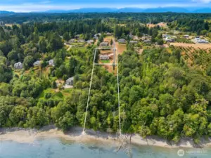 Sale includes adjacent tax parcel, which is a buildable waterfront lot. Vacant lot is 1.55 acres and house lot is 0.76 acres for a total of 2.31 acres.