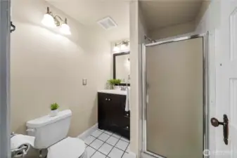 Easy-access 3/4 bath on the main level, perfect for guests or everyday convenience.