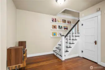 Head upstairs to find a bonus area, spacious bedroom, and equally spacious and impressive bathroom!