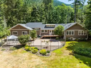 CHUCKANUT! Where cottage charm meets luxury living on a full acre with seasonal saltwater glimpses