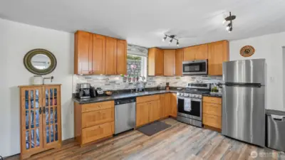 Thoughtfully designed kitchen with ample counter space for cooking and prep.