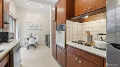 Enjoy a perfect morning flow—from kitchen prep to coffee in the breakfast nook.