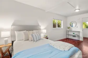 Bedroom with en suite bathroom and entrance to a big unfinished attic