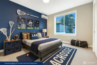 Virtually staged as a lacrosse-themed bedroom to illustrate how this spacious secondary room can inspire any young athlete. Easily accommodates a queen bed, two nightstands, plus wall space for a dresser or desk.