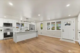 Quartz counters, backsplash and sink.
