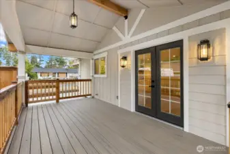 Side deck with french doors leading into great room