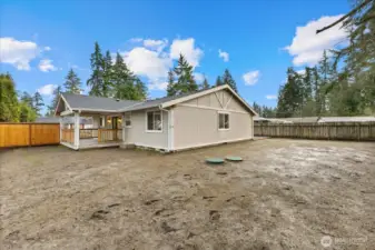 fully fenced, leveled back yard